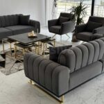Upgrade your living room with the luxurious Glory Series X 7-seater premium fabric sofa set. This elegant sofa set features gold-accented legs, perfect for complementing white marble flooring in modern interiors. Complete with a stylish center table and matching side stools, the Glory Series X offers both comfort and sophistication, making it the ideal choice for contemporary homes seeking a blend of functionality and high-end design.