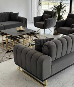 Upgrade your living room with the luxurious Glory Series X 7-seater premium fabric sofa set. This elegant sofa set features gold-accented legs, perfect for complementing white marble flooring in modern interiors. Complete with a stylish center table and matching side stools, the Glory Series X offers both comfort and sophistication, making it the ideal choice for contemporary homes seeking a blend of functionality and high-end design.