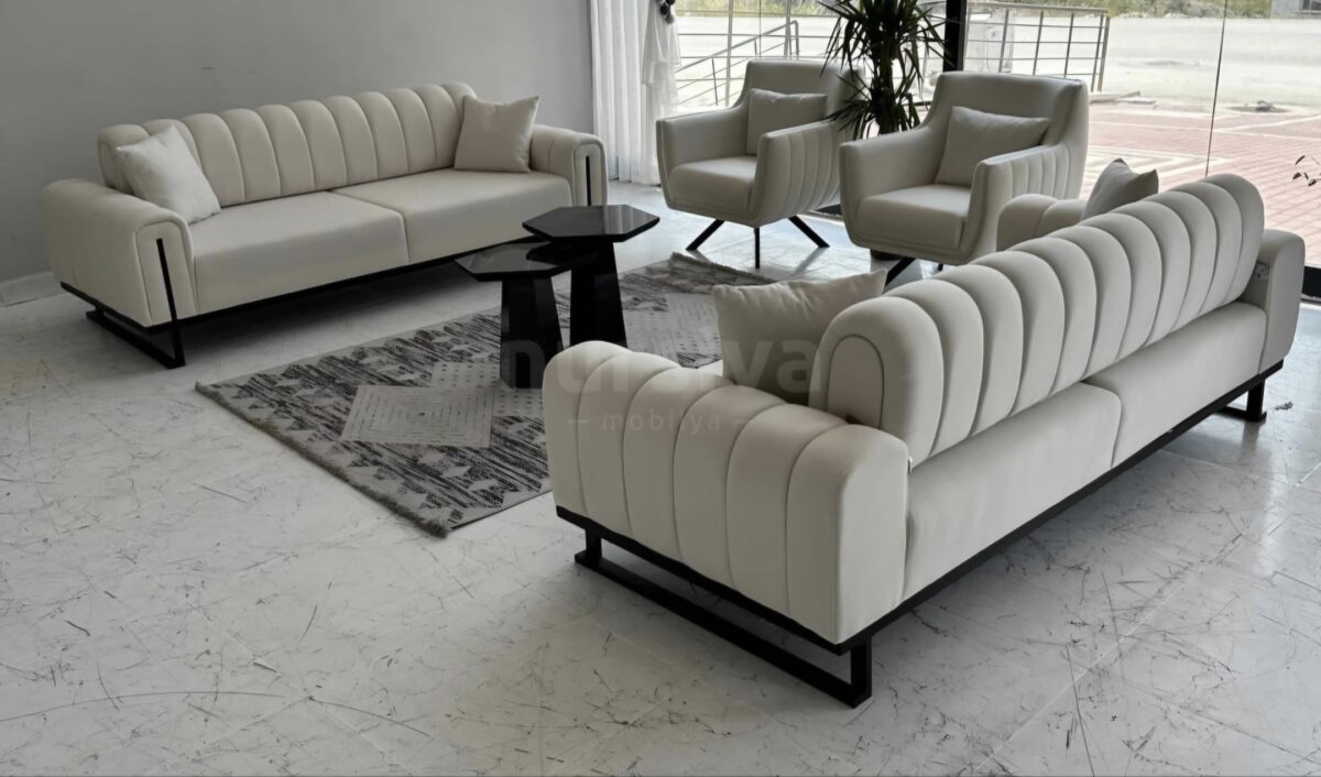Upgrade your living room with the Glory Series IX Premium Fabric 7 Seater Sofa Set (3+2+1+1). Designed for modern homes, this stylish and comfortable sofa set is perfect for placement near large windows, offering both elegance and functionality. Transform your space with the best premium fabric 7 seater sofa set and enjoy contemporary comfort in your home.
